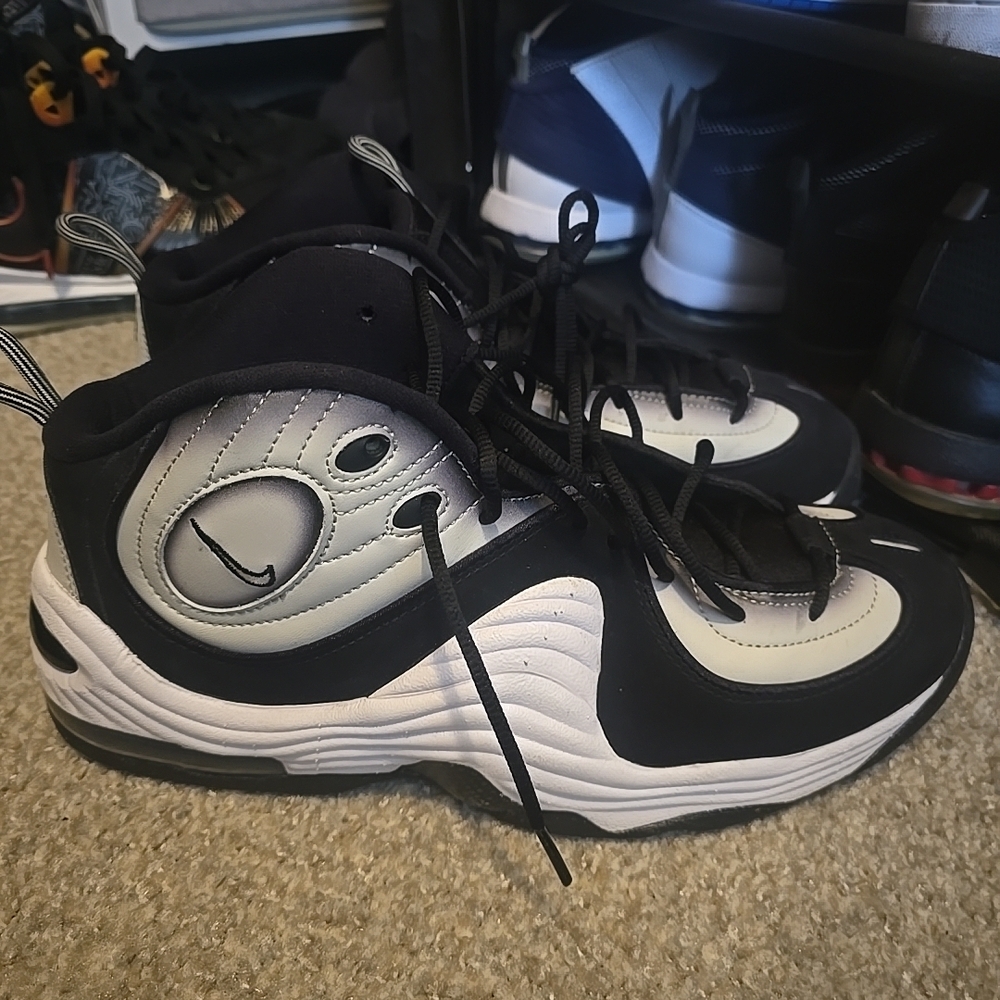 The Nike Air Penny 2 in the "Light Bone/Black" (also known as "Panda")